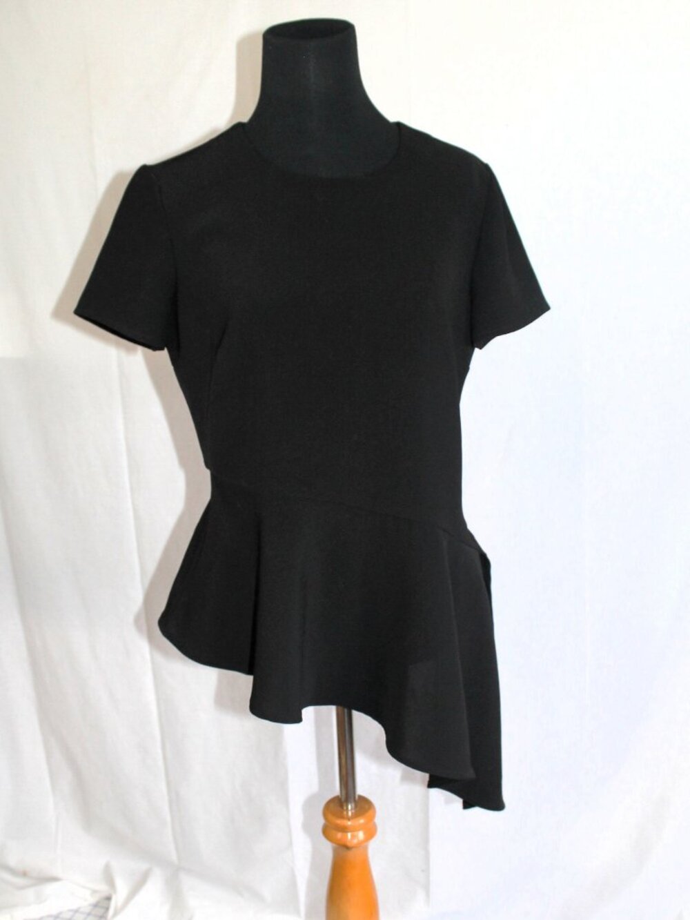 WHBM Black Asymmetrical Peplum Top Size 8